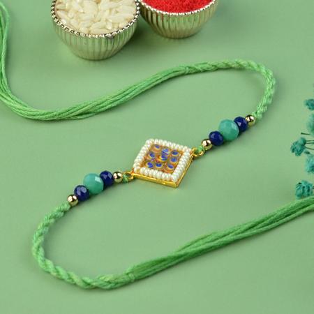 Nine Peacock Eyes Green Rakhi