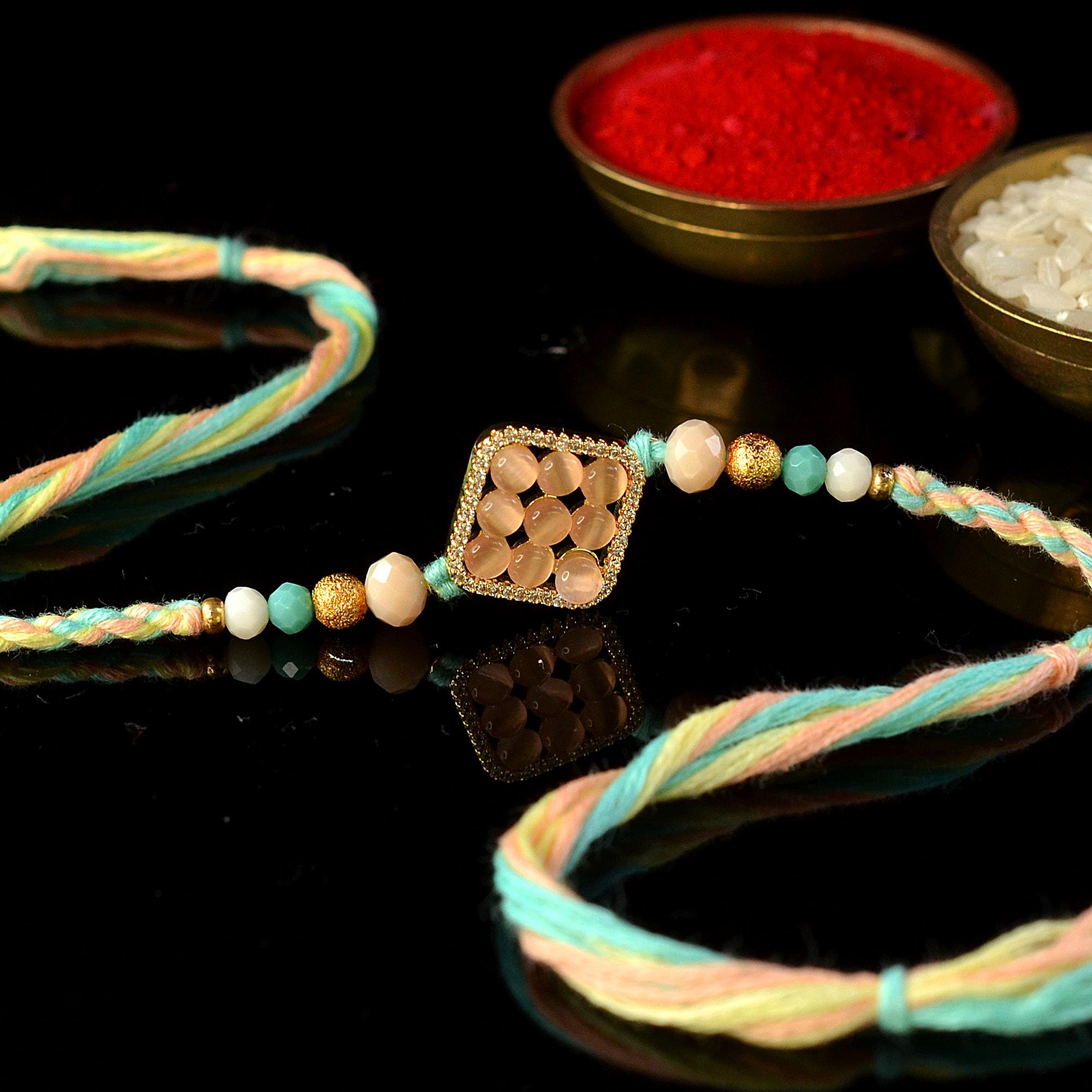 Square Rakhi Nine Crystals in a Square Rakhi | Stones Rakhi