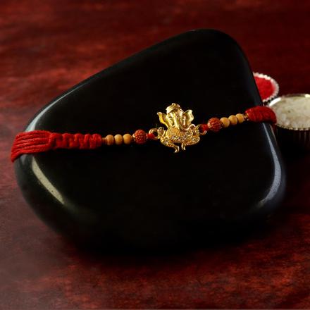 Intricate Belly Ganesh Rakhi