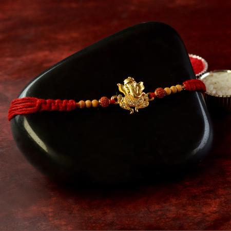 Intricate Belly Ganesh Rakhi