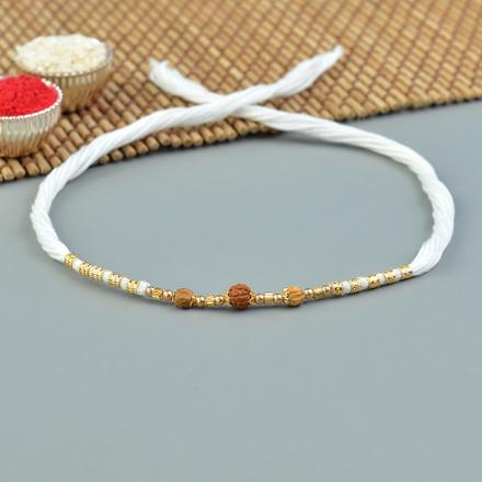 Gold Accentuated Rudraksha Rakhi