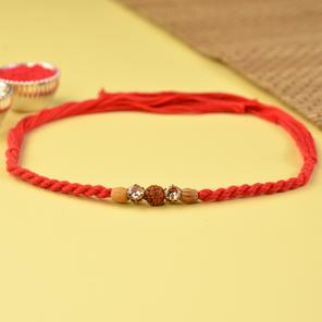 Red Twisted Dori Rudraksh Rakhi Red Twisted Dori Rudraksh Rakhi