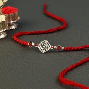 Diamond Studded Frame Om Rakhi Diamond Studded Frame Om Rakhi