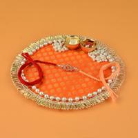 Orange Round Thali with Rakhi