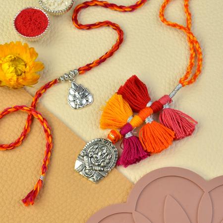 White Metal Ganesh Rakhi Lumba