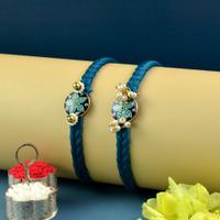 Blue Floral Shield Rakhi Pair