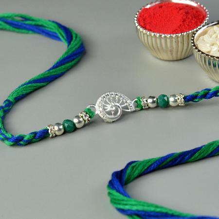 Spiraling Silver Peacock Rakhi