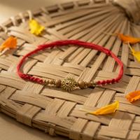 Sunburst Om Rakhi