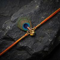 Auspicious Ganesh Peacock Rakhi
