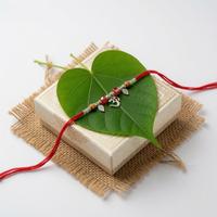 Om with Leaves Dori Rakhi