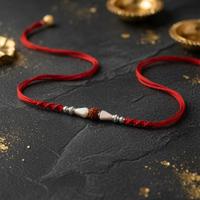 Charming Rudraksh Dori Rakhi