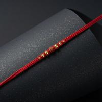 Golden Cascade Rudraksh Dori Rakhi