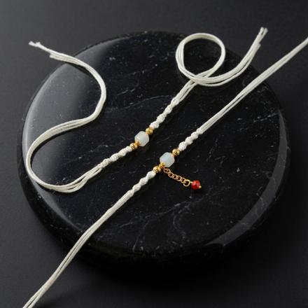 Ivory Charm Couple Rakhi Pair