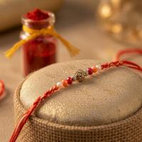 Gleaming Center Bead Rakhi
