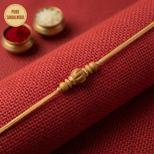Carved Sandalwood Bead Rakhi