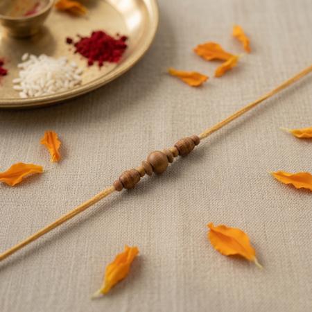 Simple Sandalwood Bead Rakhi