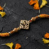 Divine Om Studded Rakhi