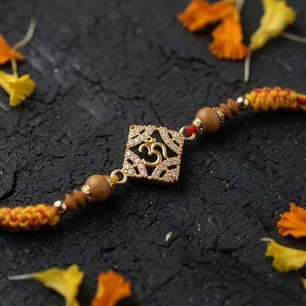Divine Om Studded Rakhi
