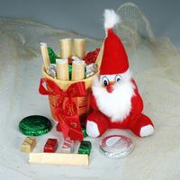 Santa with a Basketful of Christmas Goodies